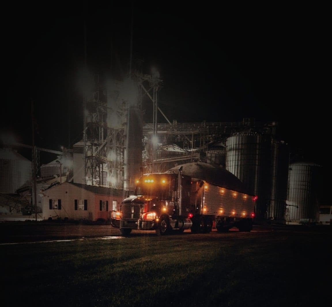 Mike Proctor Hauling Truck at Night with Lights